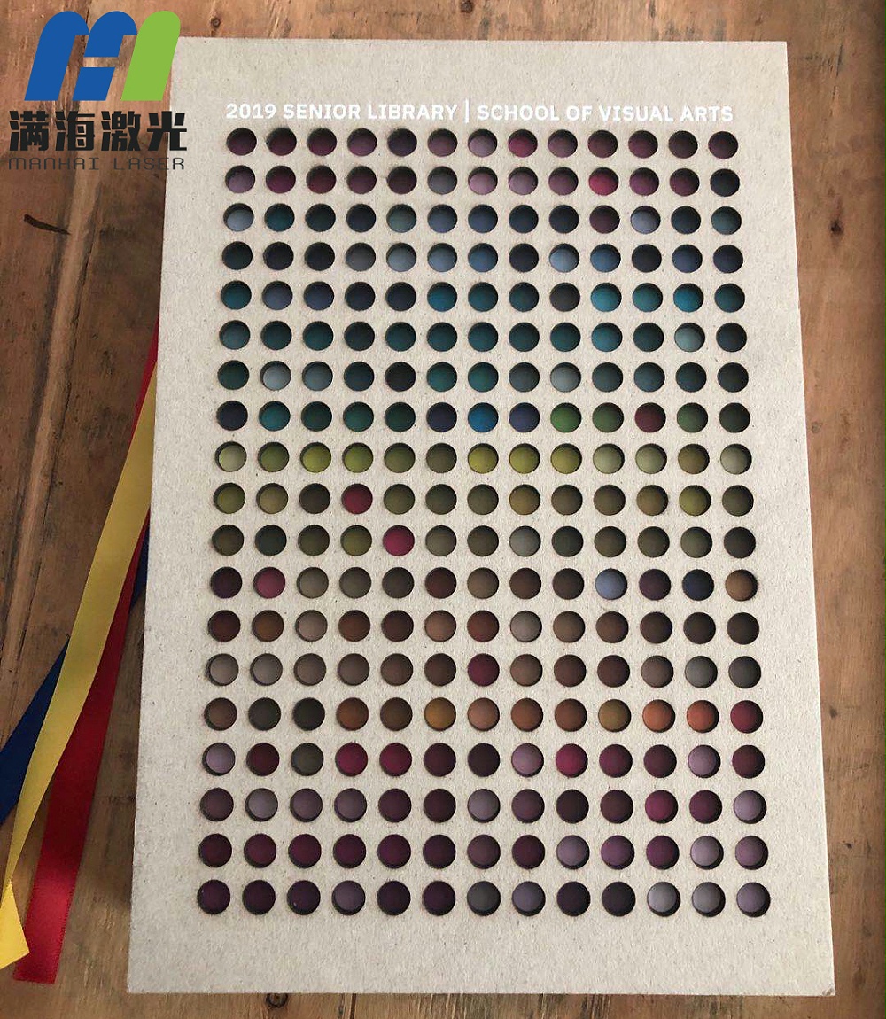 圖書封麵灰（huī）板激光雕刻打孔鏤空（kōng）
